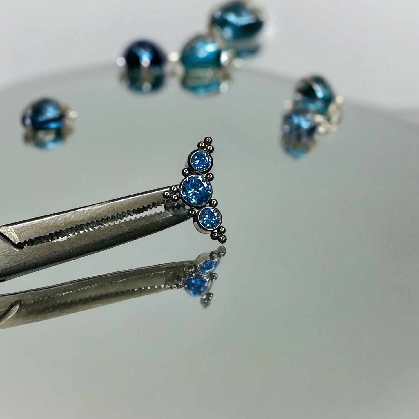 Blue zircon ornate earring collection