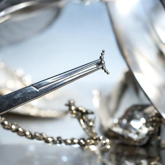 Silver ornate beaded labret piercing
