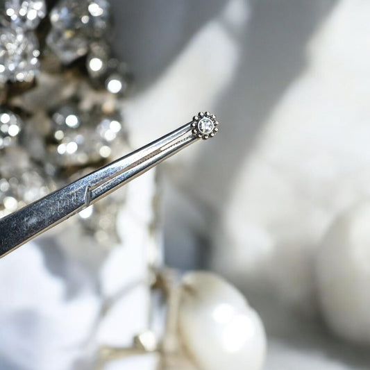 Silver ornate beaded labret piercing