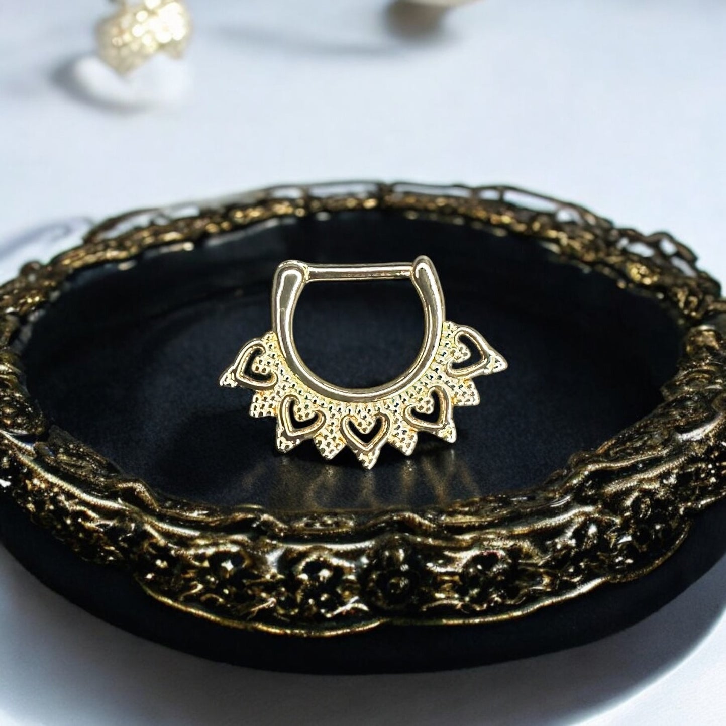 Boho inspired D shaped septum piercing