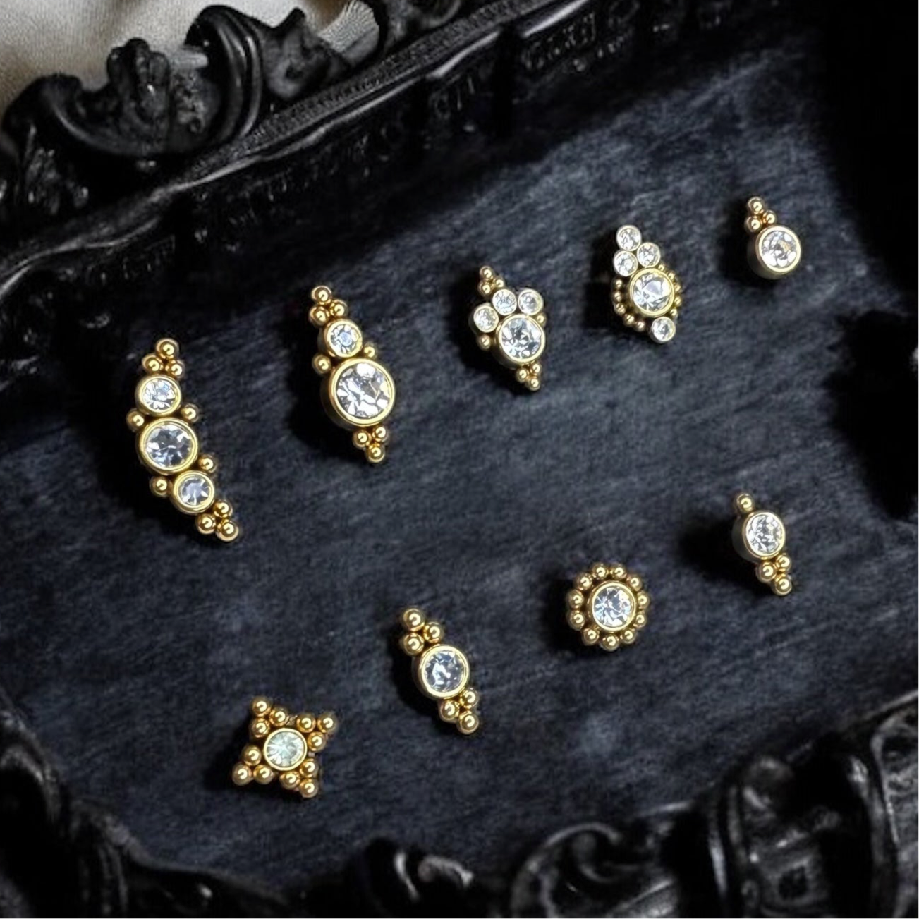 Gold ornate collection of labret earrings