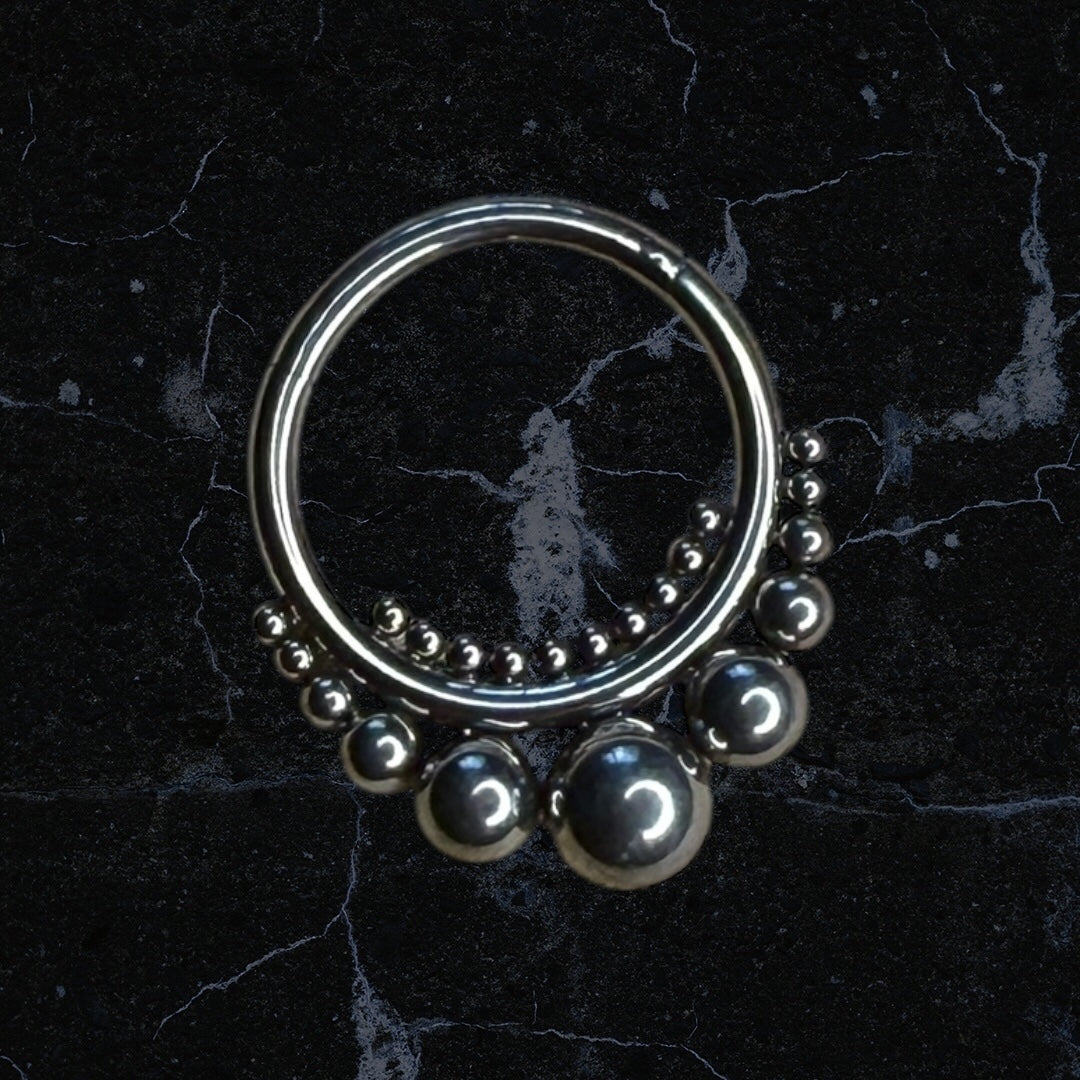 Beaded tribal design piercing rings