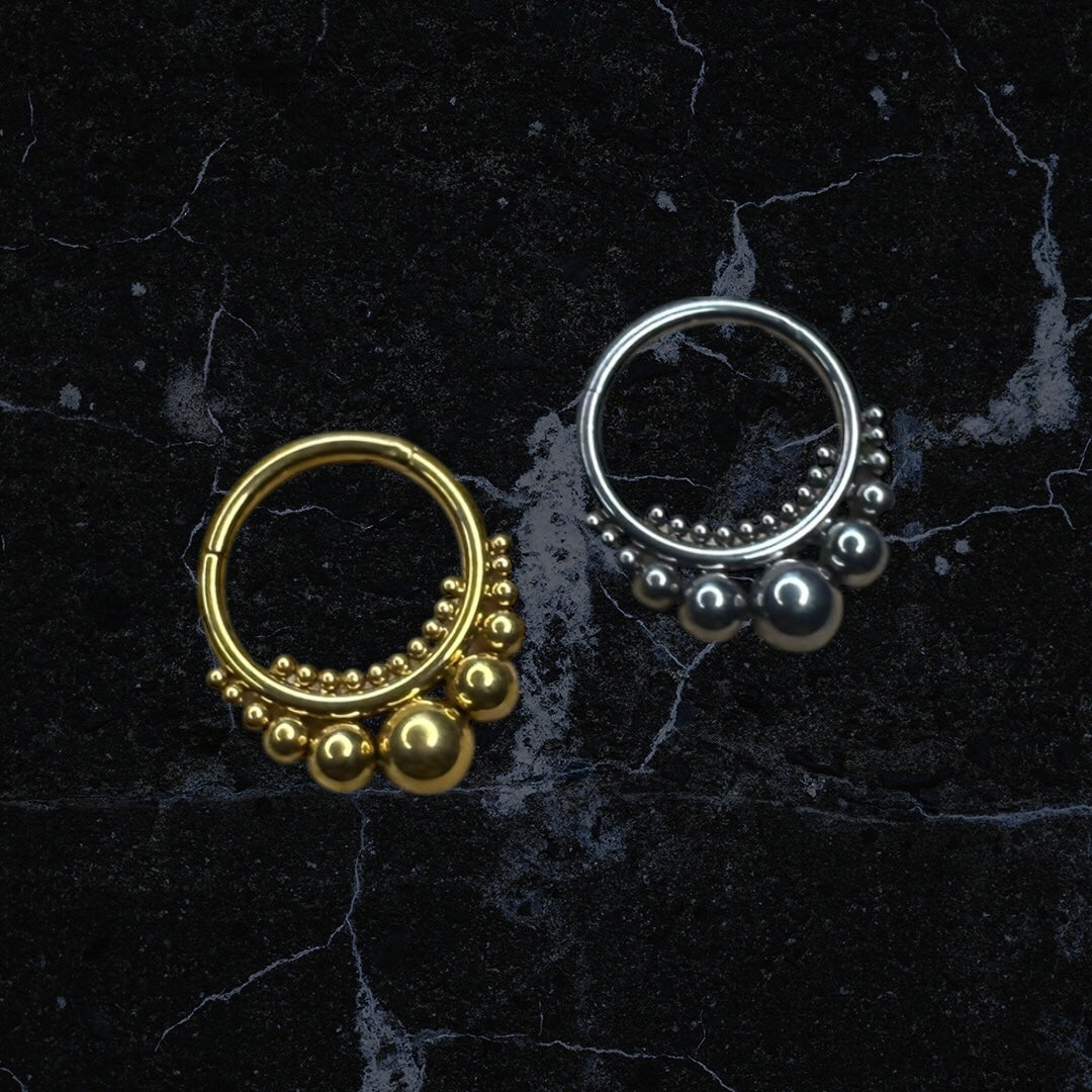 Beaded tribal design piercing rings
