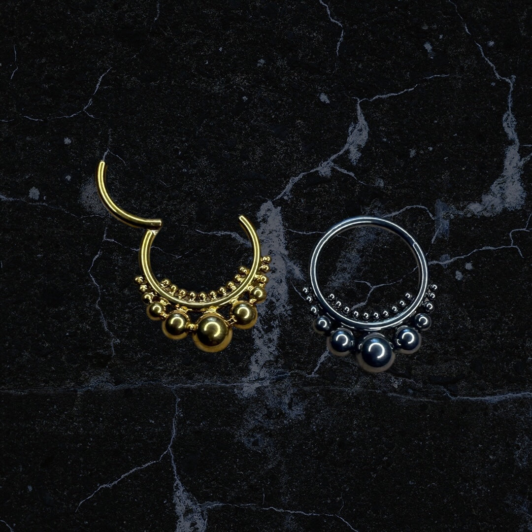 Beaded tribal design piercing rings